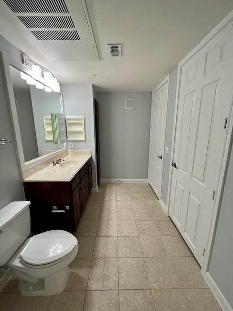7575 Kirby Dr Unit 2314, Houston, TX 77030 - bathroom with vanity and tile patterned flooring