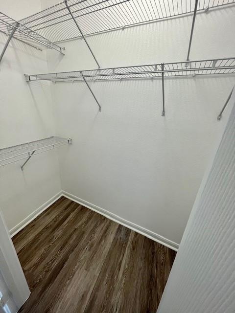 7575 Kirby Dr Unit 2314, Houston, TX 77030 - spacious closet featuring wood finished floors