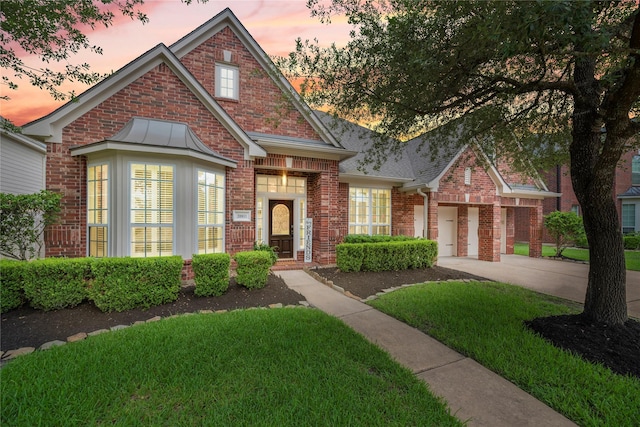 20811 S Amber Willow Trl, Cypress, TX 77433 - view of front of property with brick siding, roof with shingles, and a front lawn