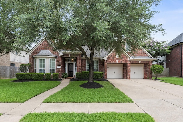 20811 S Amber Willow Trl, Cypress, TX 77433 - view of front facade featuring concrete driveway, brick siding, and a garage