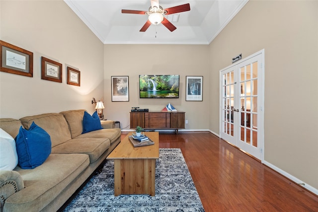 20811 S Amber Willow Trl, Cypress, TX 77433 - living room featuring wood finished floors, ceiling fan, french doors, ornamental molding, and a raised ceiling