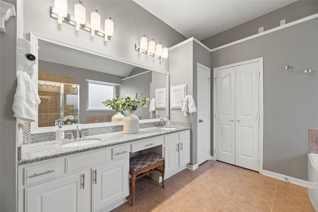 20811 S Amber Willow Trl, Cypress, TX 77433 - full bath featuring double vanity, a stall shower, a soaking tub, tile patterned flooring, and a closet