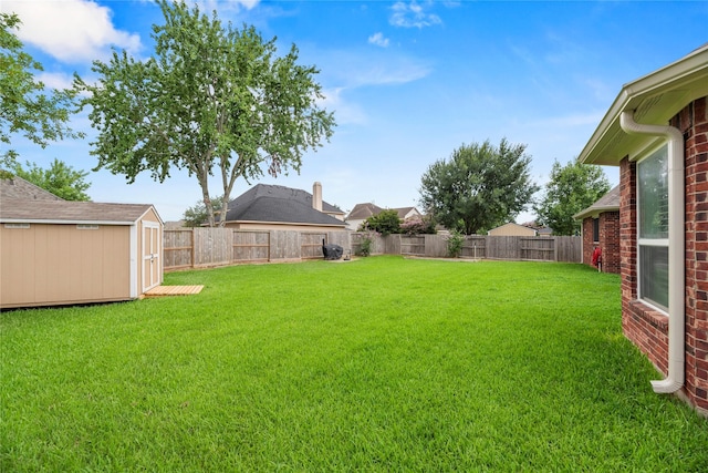 20811 S Amber Willow Trl, Cypress, TX 77433 - fenced backyard featuring a storage shed