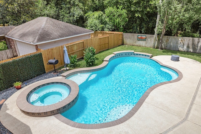 3506 Stanbury Place Ln, Katy, TX 77494 - view of swimming pool with a pool with connected hot tub, a fenced backyard, and a patio area