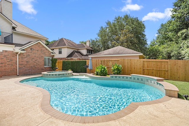 3506 Stanbury Place Ln, Katy, TX 77494 - view of swimming pool featuring a fenced backyard and a pool with connected hot tub