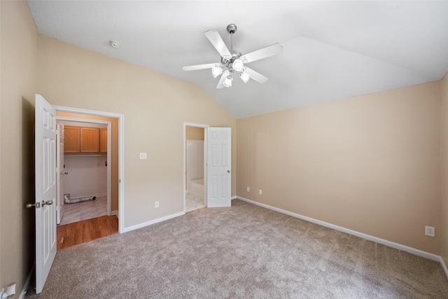 5532 N Buffalo Cir, Willis, TX 77378 - unfurnished bedroom with carpet flooring, lofted ceiling, and ceiling fan