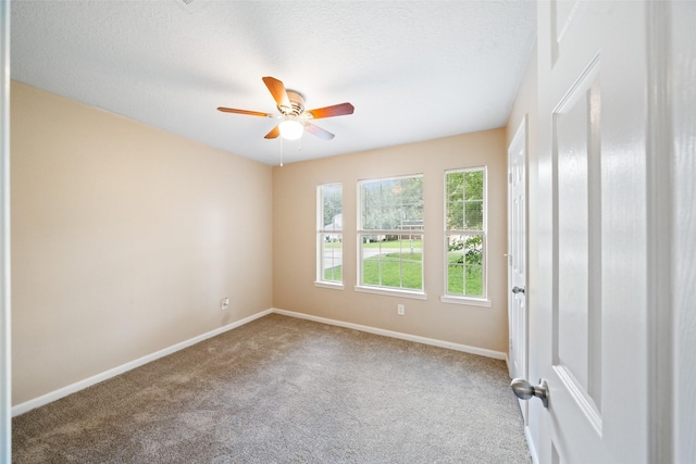 5532 N Buffalo Cir, Willis, TX 77378 - carpeted empty room featuring a ceiling fan and a textured ceiling