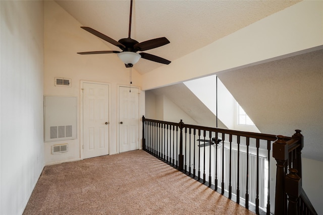 2300 Old Spanish Trl Unit 2063, Houston, TX 77054 - bonus room featuring ceiling fan, carpet, high vaulted ceiling, and a textured ceiling