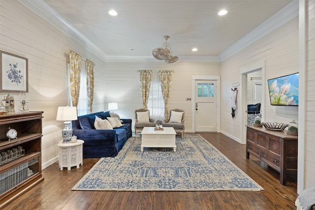 91 Willow St, Point Blank, TX 77364 - living room featuring ornamental molding, a chandelier, dark wood-type flooring, wood walls, and recessed lighting