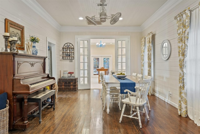 91 Willow St, Point Blank, TX 77364 - dining area featuring a chandelier, wood-type flooring, ornamental molding, wood walls, and recessed lighting