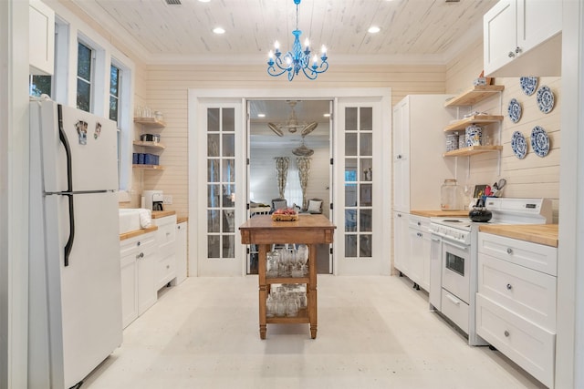91 Willow St, Point Blank, TX 77364 - kitchen featuring white appliances, open shelves, butcher block countertops, wooden ceiling, and a chandelier