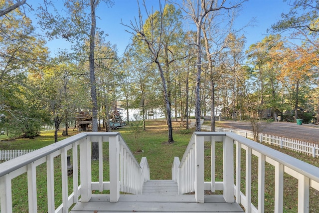 91 Willow St, Point Blank, TX 77364 - wooden deck featuring a yard