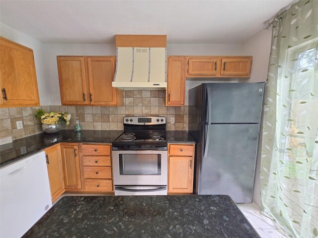 2922 Whetrock Ln, Sugar Land, TX 77479 - kitchen featuring freestanding refrigerator, stainless steel electric stove, white dishwasher, ventilation hood, and dark stone counters
