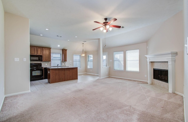 1814 High Falls Ln, Pearland, TX 77581 - unfurnished living room with a ceiling fan, a premium fireplace, light carpet, lofted ceiling, and recessed lighting