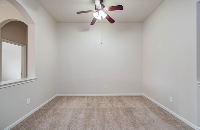 1814 High Falls Ln, Pearland, TX 77581 - carpeted spare room with a ceiling fan and arched walkways