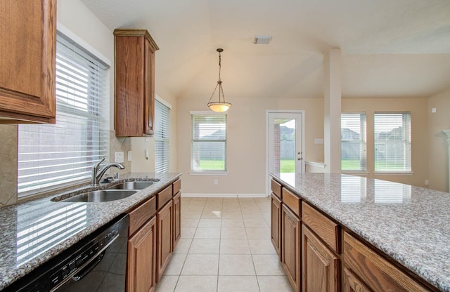 1814 High Falls Ln, Pearland, TX 77581 - kitchen featuring dishwasher, brown cabinets, hanging light fixtures, light stone countertops, and light tile patterned floors