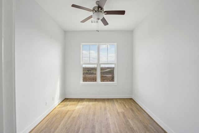 26726 Estuary Dr, Galveston, TX 77554 - unfurnished room featuring light wood-style floors and ceiling fan