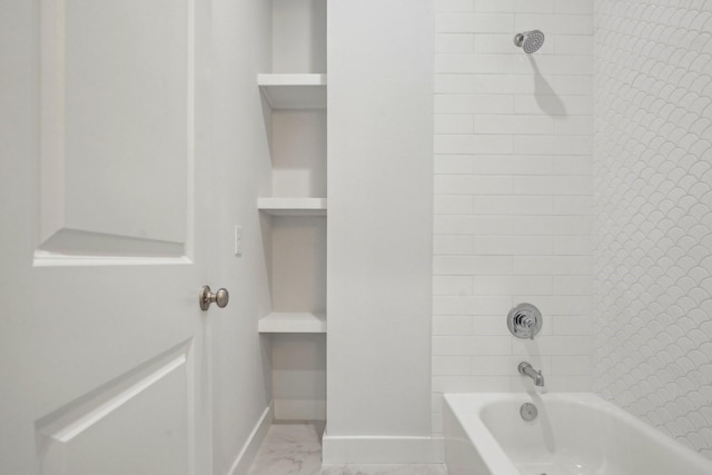 26726 Estuary Dr, Galveston, TX 77554 - full bathroom with marble look tile flooring and  shower combination
