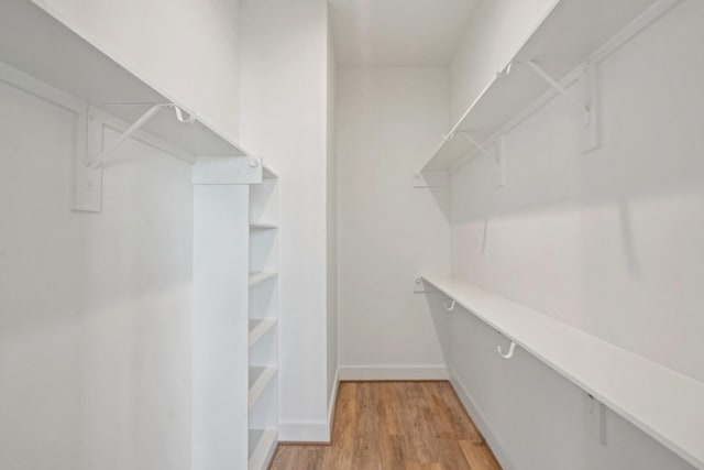 26726 Estuary Dr, Galveston, TX 77554 - spacious closet featuring light wood-type flooring