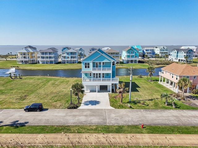 26726 Estuary Dr, Galveston, TX 77554 - aerial perspective of suburban area with a nearby body of water