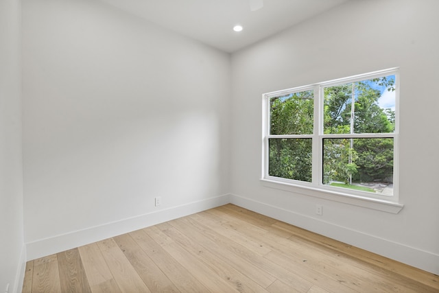 5200 Mimosa Dr, Bellaire, TX 77401 - empty room featuring healthy amount of natural light, hardwood / wood-style flooring, and recessed lighting