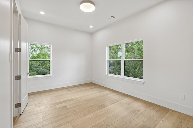 5200 Mimosa Dr, Bellaire, TX 77401 - unfurnished room with light wood-type flooring and recessed lighting