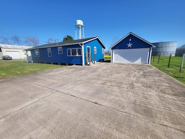 211 Peach St, Sweeny, TX 77480 - ranch-style house with an outdoor structure, a front yard, and a garage