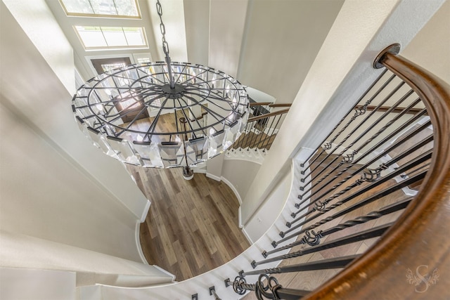 27706 Lakeway Trail Ln, Fulshear, TX 77441 - staircase featuring wood finished floors and baseboards
