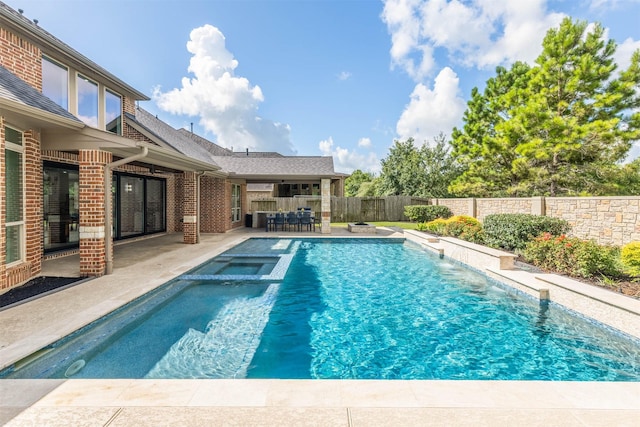 27706 Lakeway Trail Ln, Fulshear, TX 77441 - view of pool with a patio area, a fenced backyard, and a pool with connected hot tub