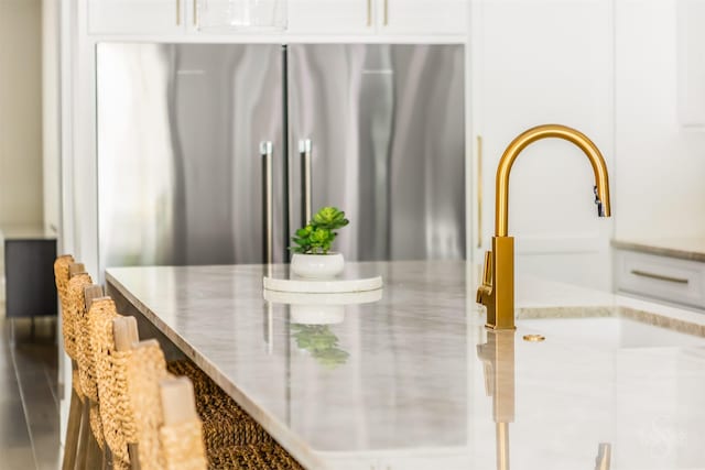 27706 Lakeway Trail Ln, Fulshear, TX 77441 - detailed view of stainless steel refrigerator and a sink