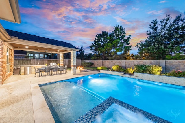 27706 Lakeway Trail Ln, Fulshear, TX 77441 - view of pool with a fenced backyard, a patio area, a fire pit, ceiling fan, and a pool with connected hot tub