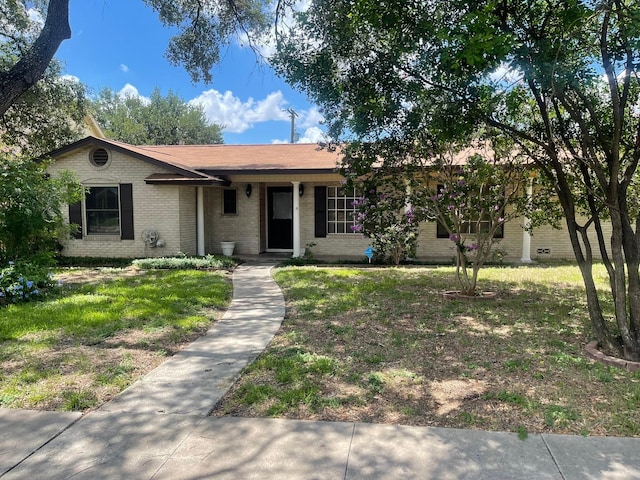 3102 Satellite Dr, San Antonio, TX 78217 - view of front of house featuring brick siding and a front yard