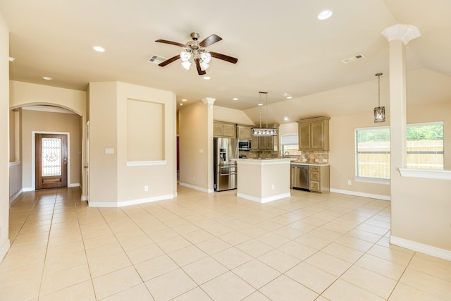 101 Brazos Ct, Richwood, TX 77531 - unfurnished living room featuring lofted ceiling, arched walkways, light tile patterned floors, ceiling fan, and recessed lighting