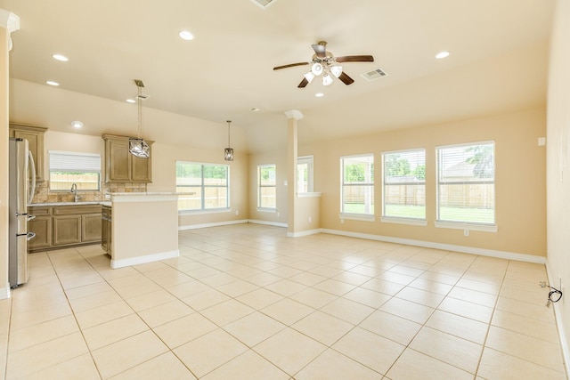 101 Brazos Ct, Richwood, TX 77531 - unfurnished living room featuring healthy amount of natural light, a ceiling fan, light tile patterned flooring, lofted ceiling, and recessed lighting
