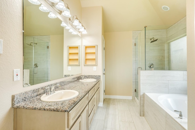101 Brazos Ct, Richwood, TX 77531 - bathroom with a stall shower, a garden tub, double vanity, and vaulted ceiling