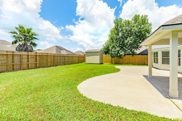 101 Brazos Ct, Richwood, TX 77531 - fenced backyard featuring a storage shed and a patio area