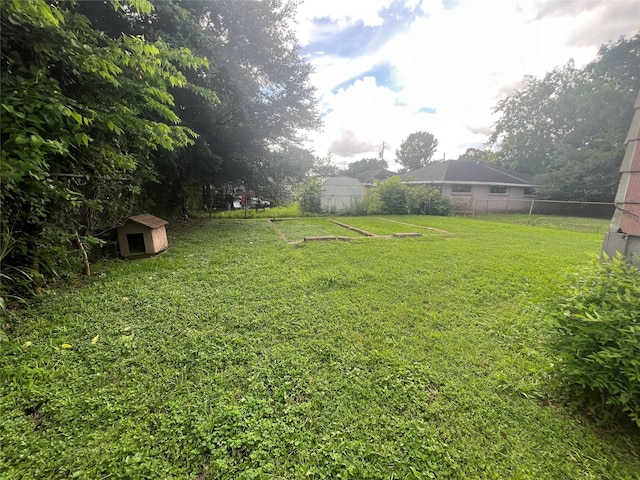 3418 Dennis St Unit 1, Houston, TX 77004 - view of yard featuring a storage shed