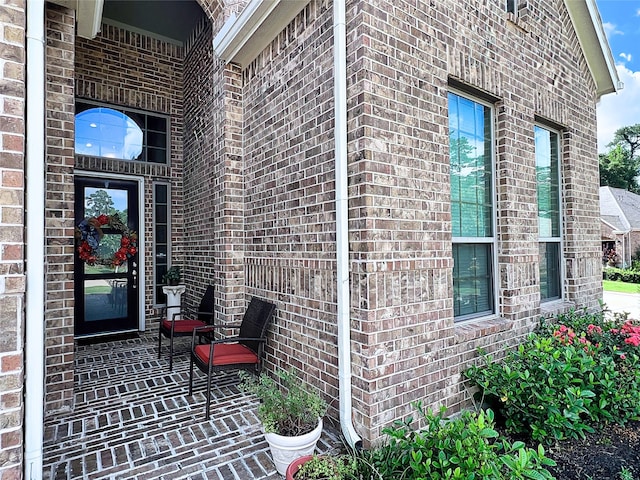 2 Ruchill Cir, Conroe, TX 77304 - view of exterior entry with brick siding
