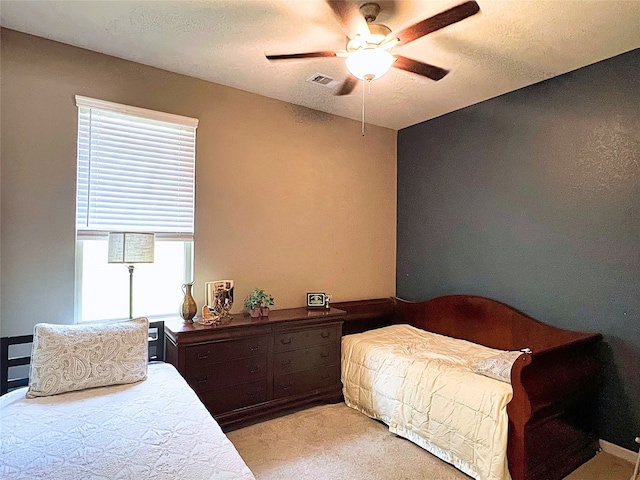 2 Ruchill Cir, Conroe, TX 77304 - bedroom featuring light colored carpet and ceiling fan