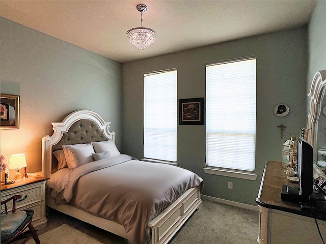 2 Ruchill Cir, Conroe, TX 77304 - carpeted bedroom featuring baseboards