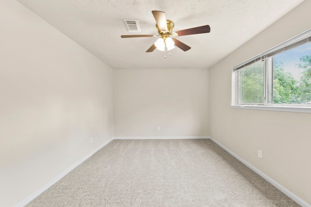 3735 Pineleaf Dr, Houston, TX 77068 - spare room with ceiling fan and light carpet