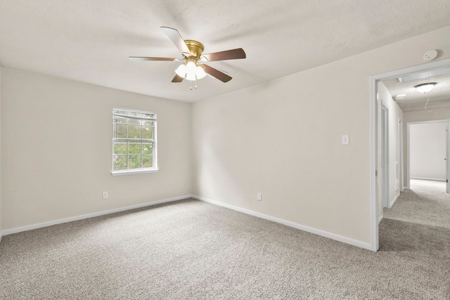 3735 Pineleaf Dr, Houston, TX 77068 - carpeted empty room featuring ceiling fan, attic access, and a smoke detector