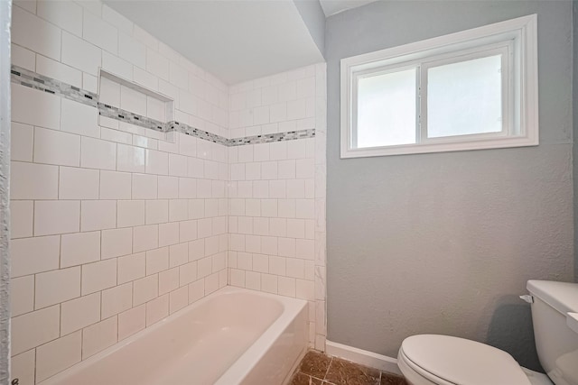 10659 Hazelhurst Dr, Houston, TX 77043 - bathroom featuring toilet and shower / bath combination