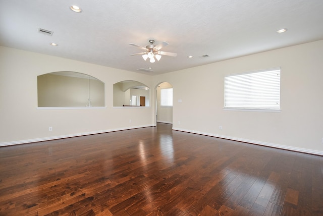 3315 Tulip Ranch Dr, Katy, TX 77494 - unfurnished room featuring a ceiling fan, wood-type flooring, recessed lighting, and arched walkways