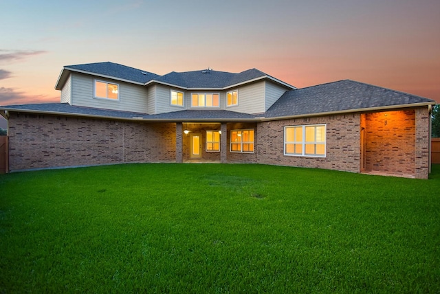 3315 Tulip Ranch Dr, Katy, TX 77494 - rear view of property featuring brick siding and a shingled roof