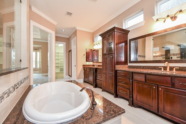 25518 Millbrook Bend Ln, Katy, TX 77494 - bathroom with ornamental molding, a whirlpool tub, vanity, and tiled shower
