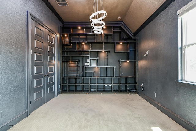 25518 Millbrook Bend Ln, Katy, TX 77494 - home theater room with a textured wall, carpet floors, and vaulted ceiling
