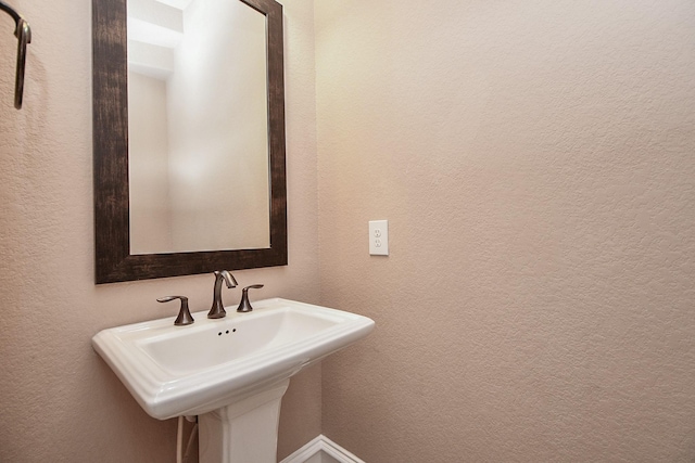 25518 Millbrook Bend Ln, Katy, TX 77494 - bathroom with a sink and a textured wall