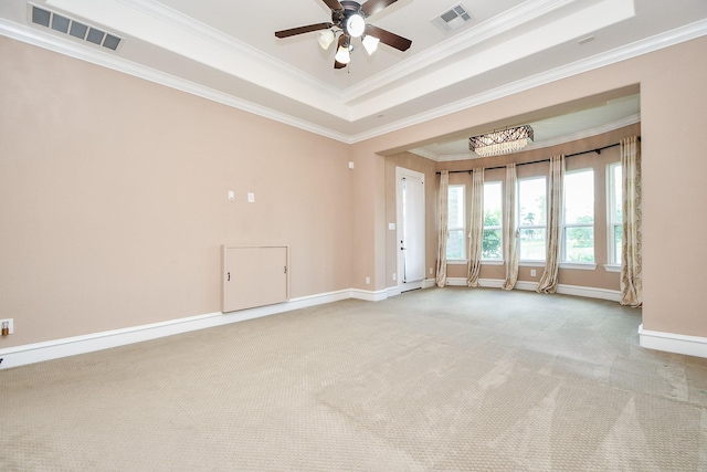 25518 Millbrook Bend Ln, Katy, TX 77494 - empty room featuring crown molding, a ceiling fan, carpet, and a raised ceiling