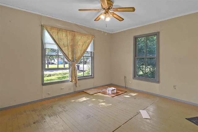 531 Circle Dr, La Porte, TX 77571 - spare room with hardwood / wood-style flooring, plenty of natural light, and a ceiling fan